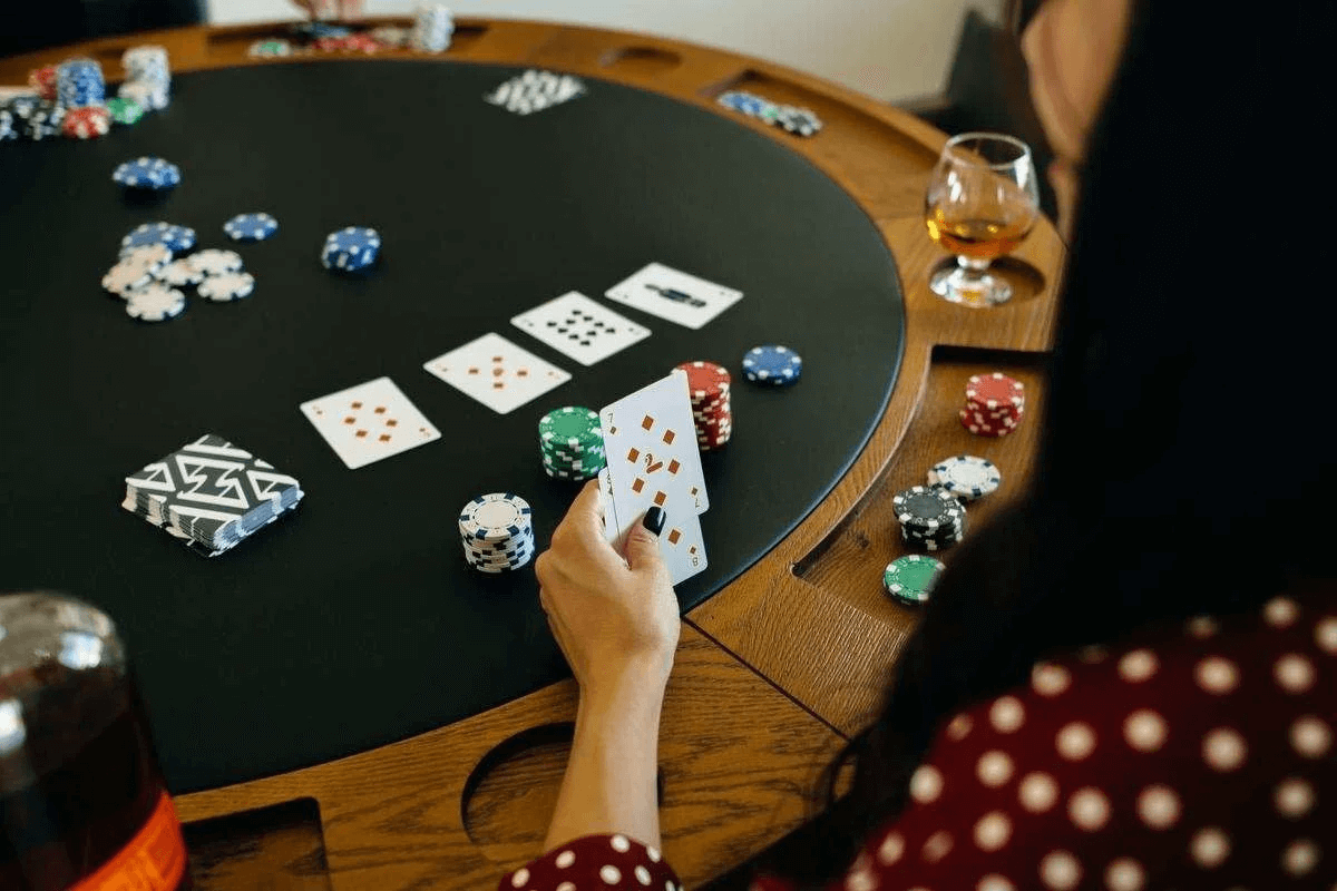 poker table with card game at a vacation rental 