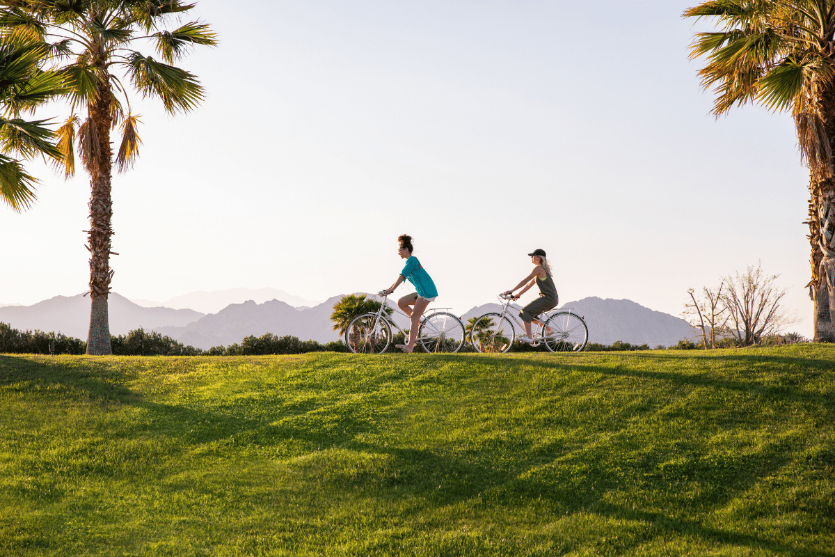 people biking on vacation to stay fit