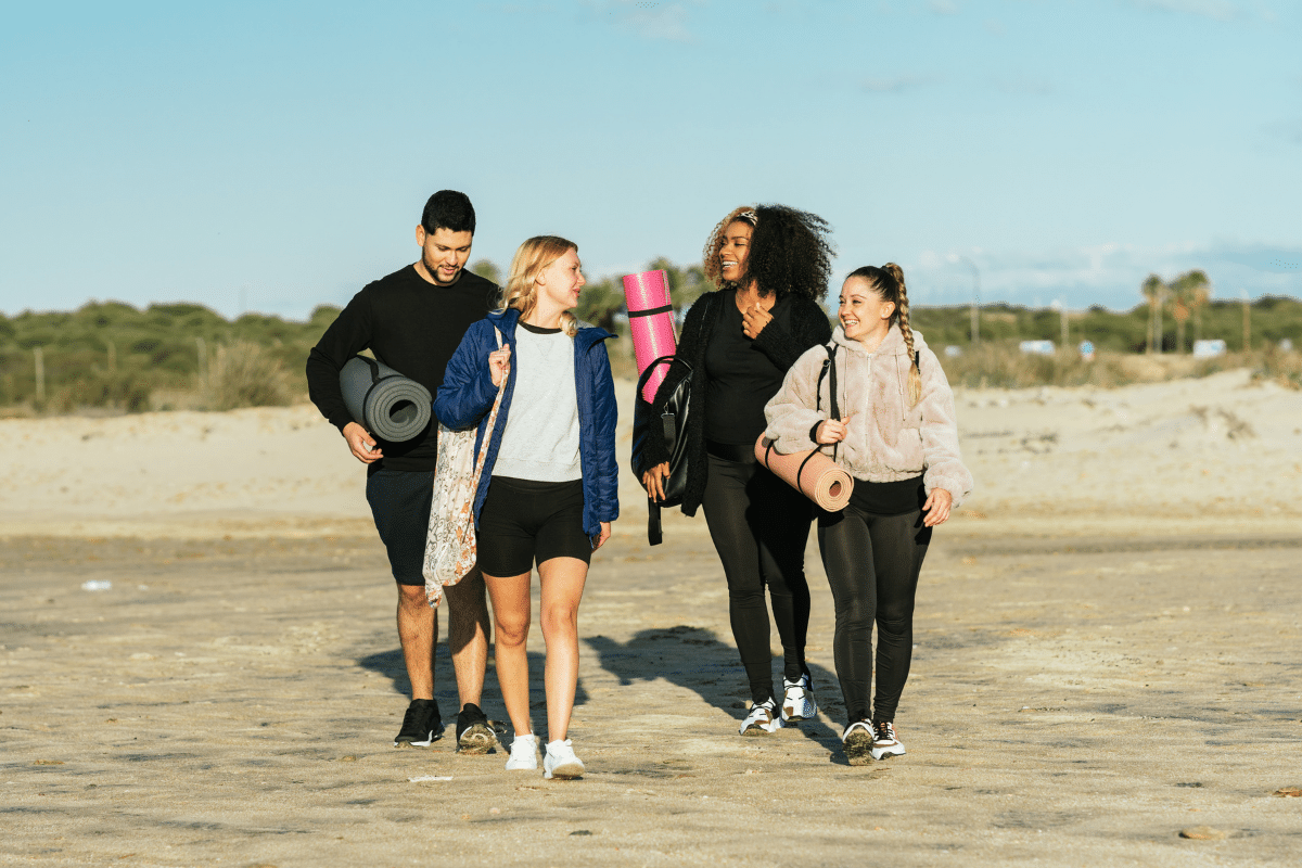 group with travel workout equipment on vacation