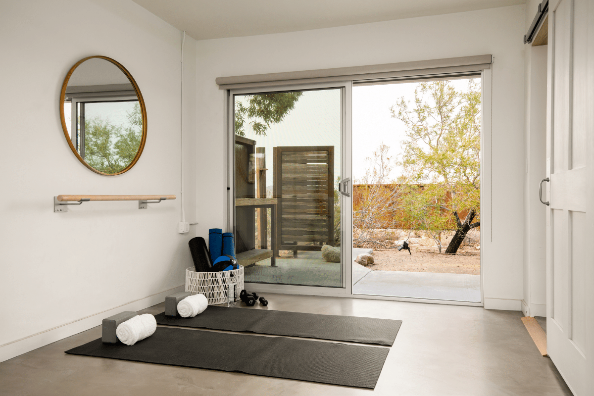 yoga mats set up in a joshua tree vacation rental