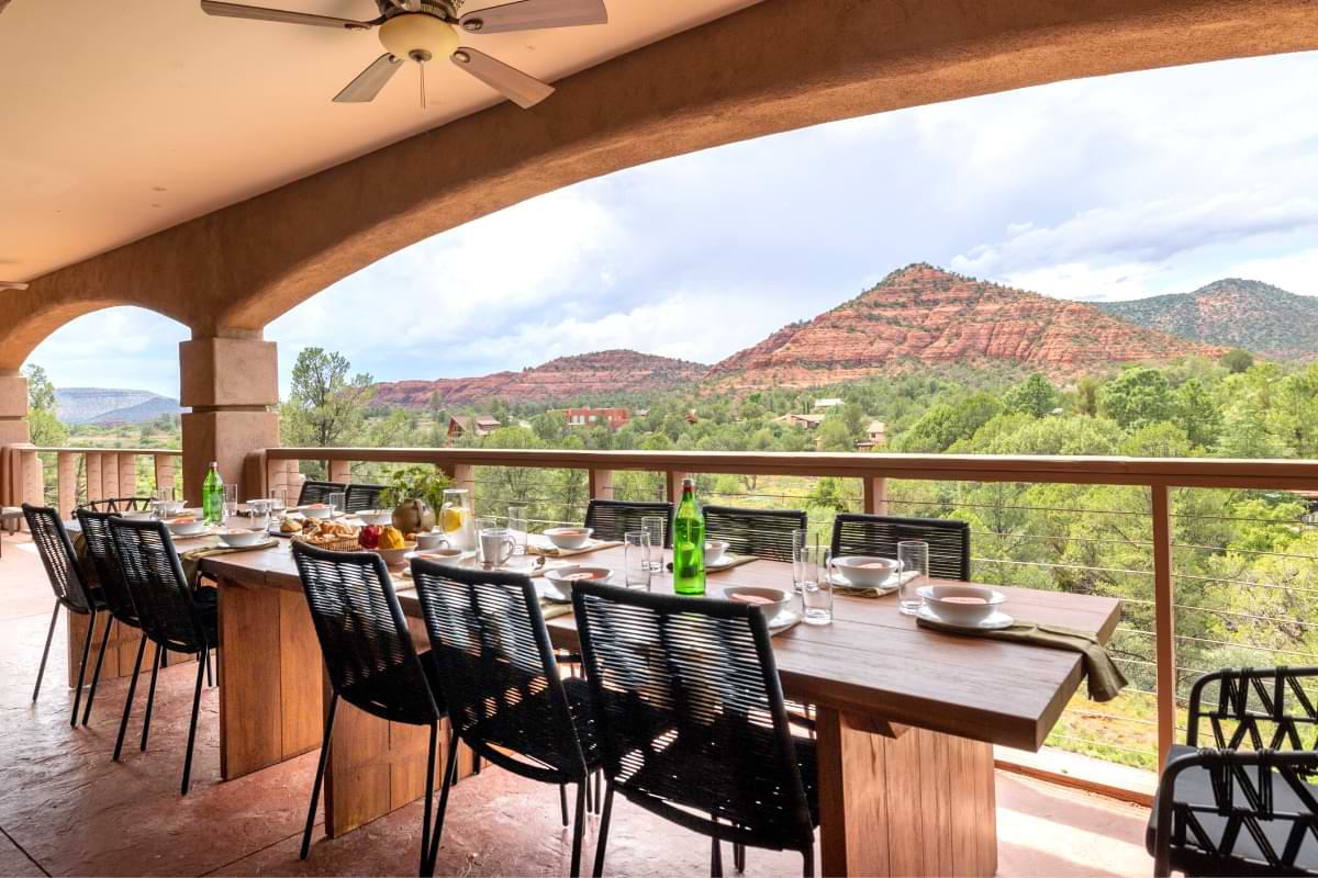 fill your entire group around this large table for friendsgiving at a sedona vacation rental