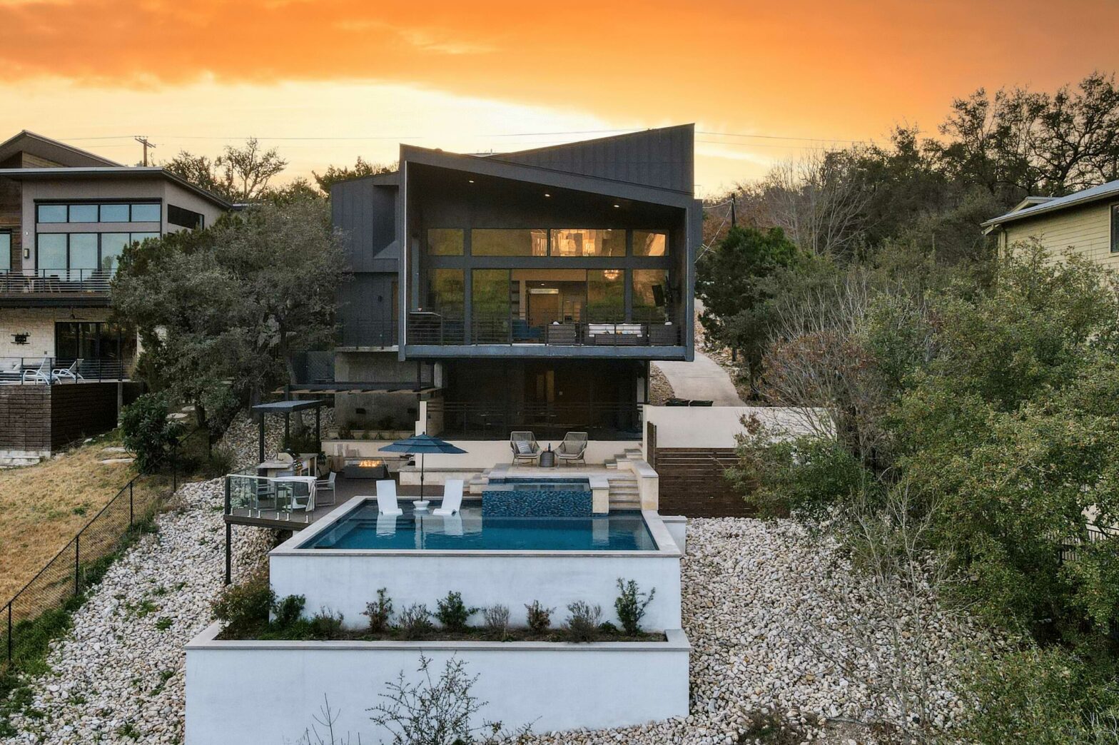 beautiful austin vacation rental with black exteriors and a pool
