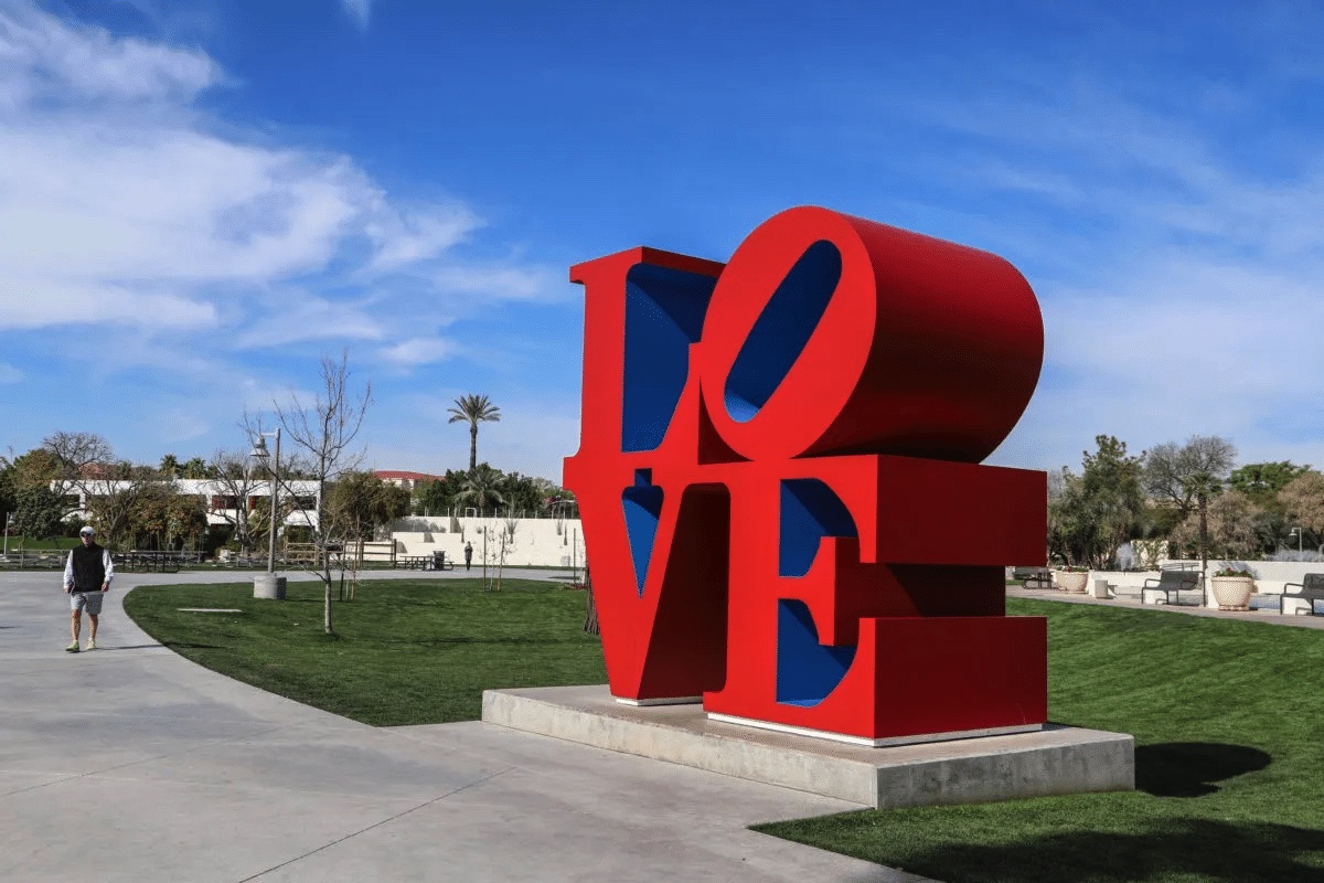 The letters L, O, V, & E, sculpted into a red statue in the Scottsdale Civic Center Mall