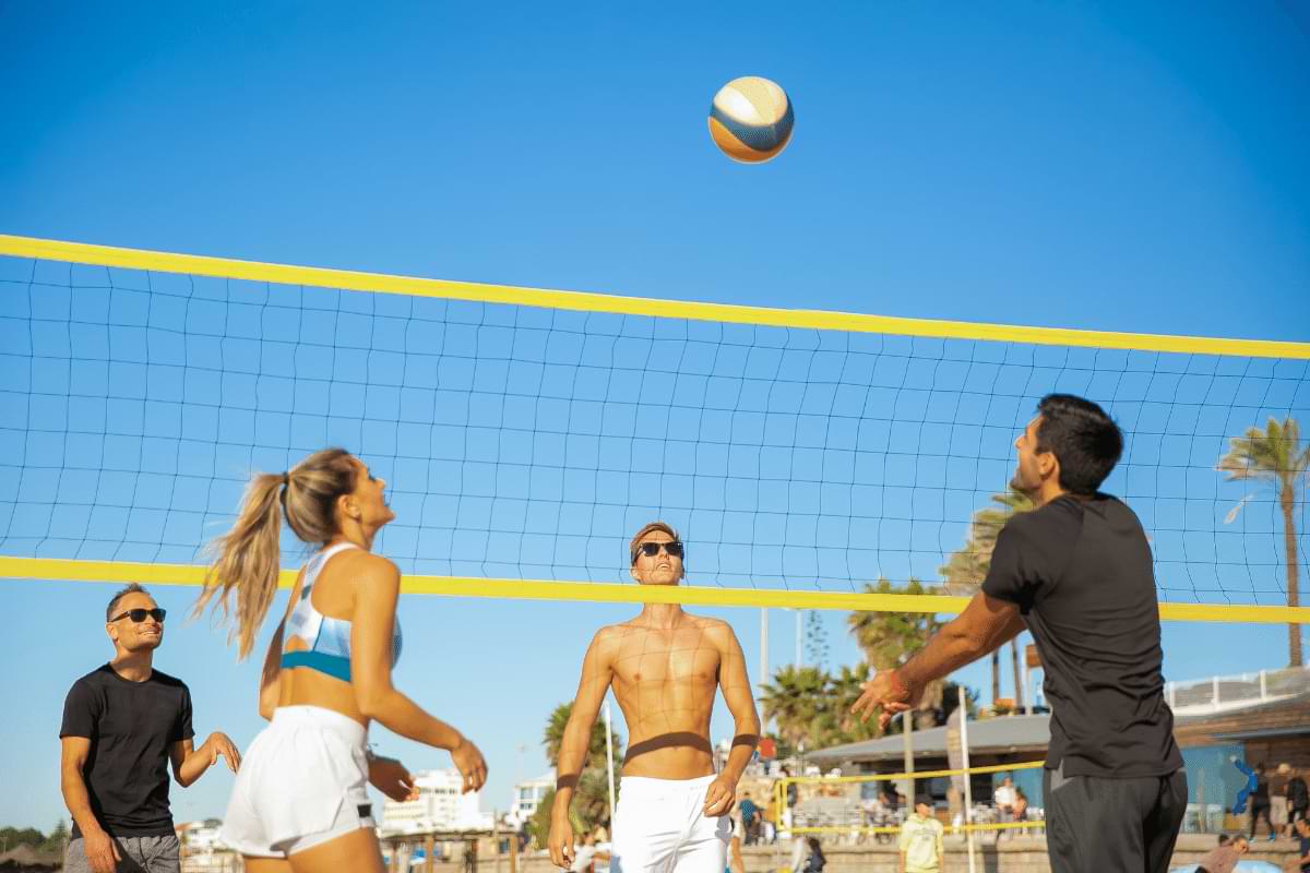 playing beach volleyball is a classic thing to do in malibu